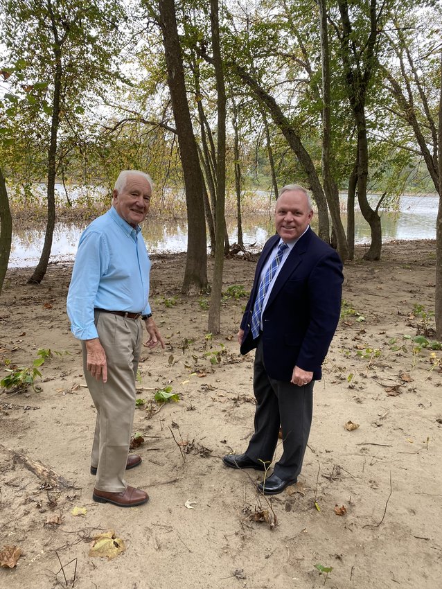 Attorney John “Duke” Schneider, left, with Delaware Valley School District Superintendent, Dr. John Bell, standing on a small portion of the donated land at the Delaware River
